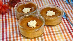 Pumpkin Custard cups on plaid overlay linen